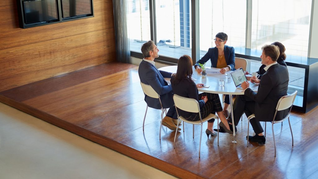 Businesspeople working at a table