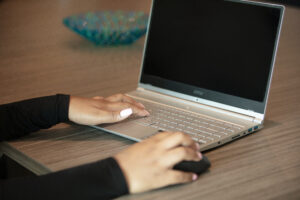 woman hands on laptop