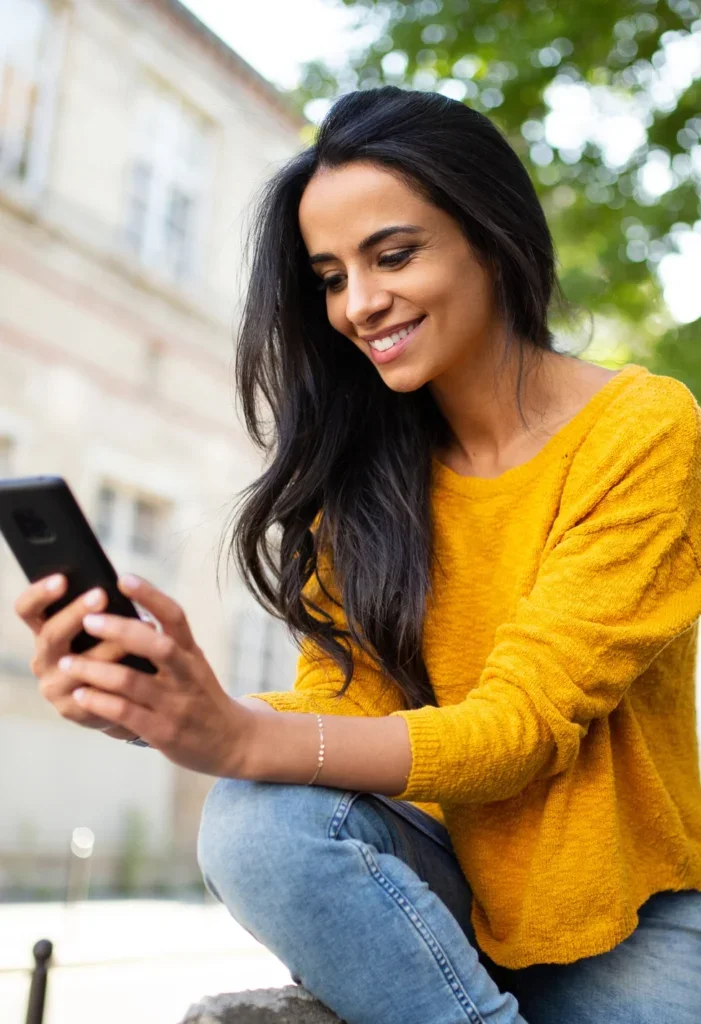 woman holding a phone