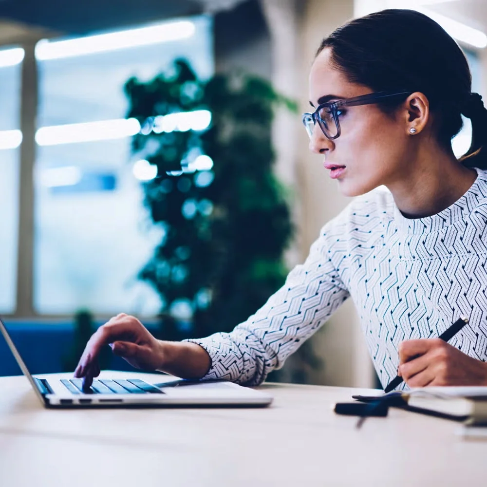 woman laptop glasses
